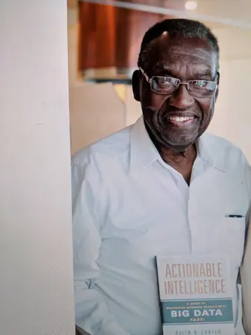 Reader holding Actionable Intelligence