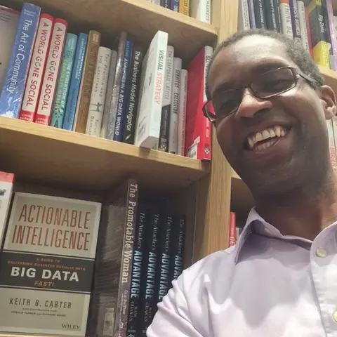 Reader holding Actionable Intelligence