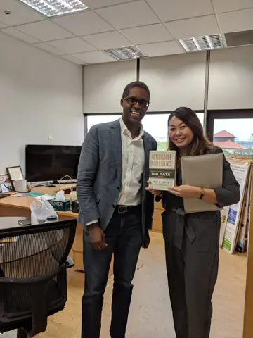 Reader holding Actionable Intelligence in Singapore, September 2019