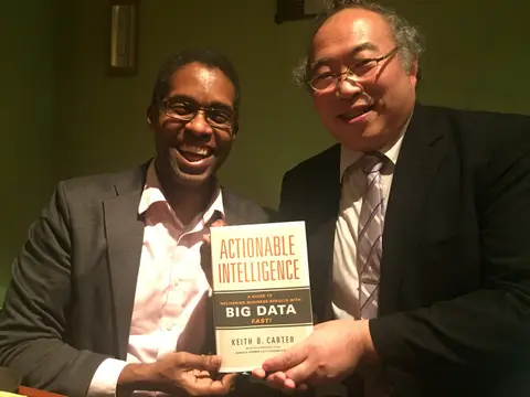 Reader holding Actionable Intelligence in Setagaya, Tokyo, Japan, November 2015