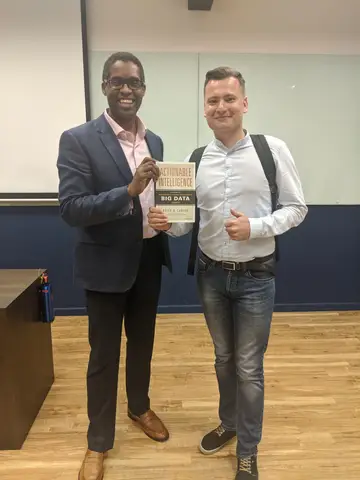 Reader holding Actionable Intelligence in Singapore, November 2019