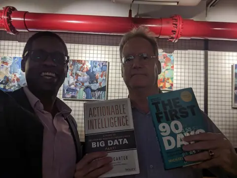 Reader holding Actionable Intelligence in Singapore, May 2019
