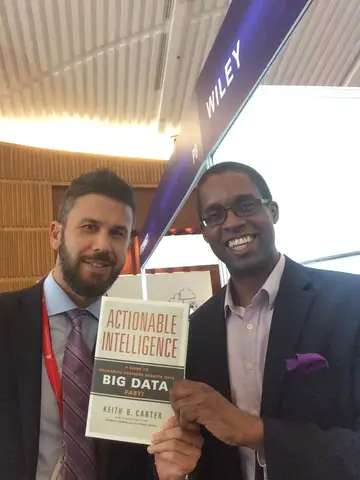 Reader holding Actionable Intelligence in April 2015