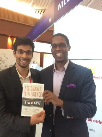 Reader holding Actionable Intelligence in April 2015