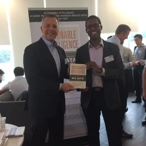 Reader holding Actionable Intelligence in November 2015