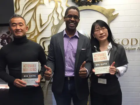 Reader holding Actionable Intelligence in Minato, Tokyo, Japan, November 2015