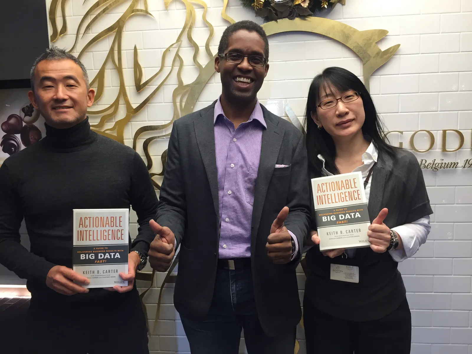 Reader holding Actionable Intelligence in Minato, Tokyo, Japan, November 2015
