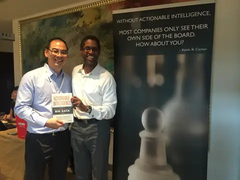 Reader holding Actionable Intelligence in Singapore, March 2016
