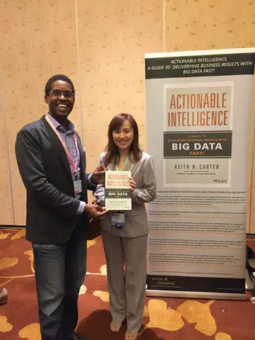 Reader holding Actionable Intelligence in Singapore, September 2016