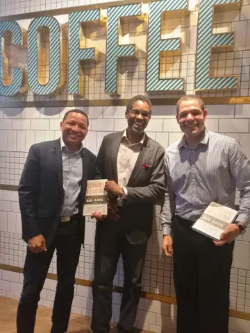 Reader holding Actionable Intelligence in Singapore, September 2017
