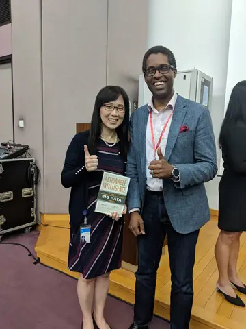 Reader holding Actionable Intelligence in Singapore, February 2019